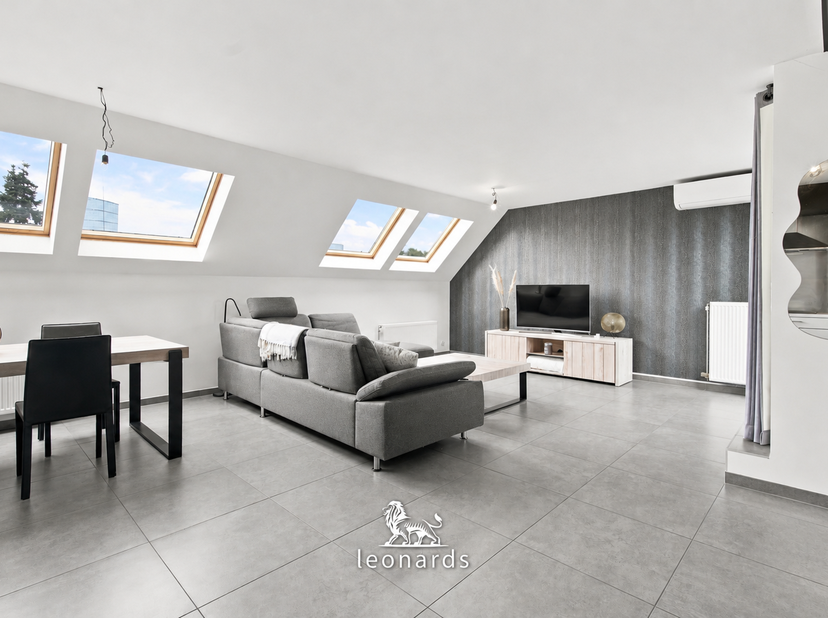 Cet appartement est situé Rijksweg 106 à Wielsbeke, dans un emplacement central et facilement accessible, offrant une bonne connexion avec les commune