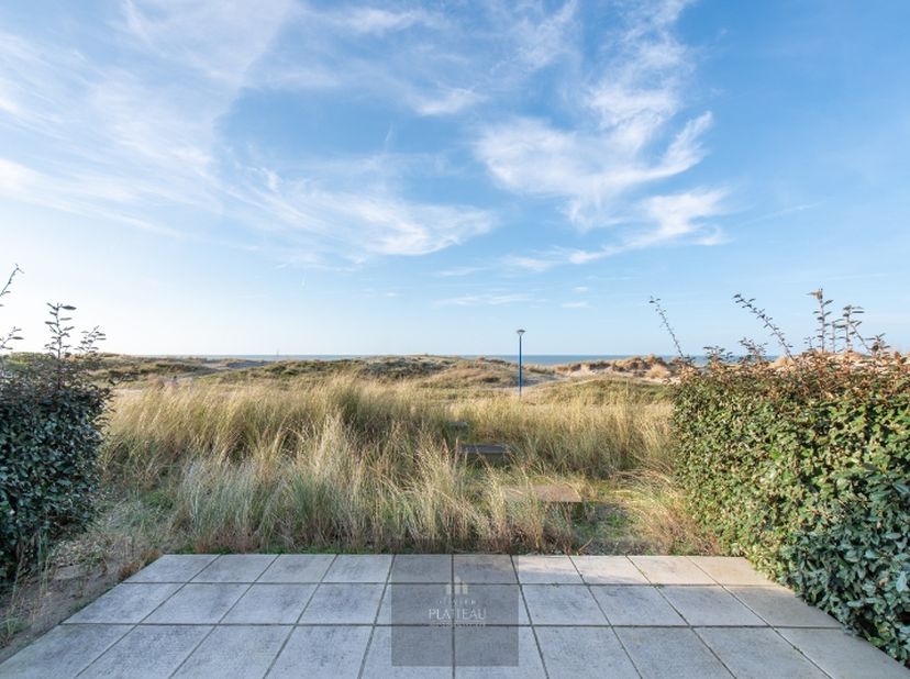 Appartement en traversée exceptionnel situé dans la prestigieuse résidence The Sanctuary, en première ligne de la plage de Groenendijk à Oostduinkerke