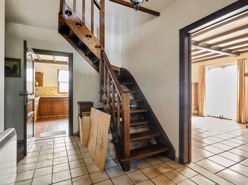 Te renoveren mooie open bebouwing op prachtig perceel<br />
Ligging: Gelegen in een rustige en aangename woonomgeving in Brasschaat geniet deze woning