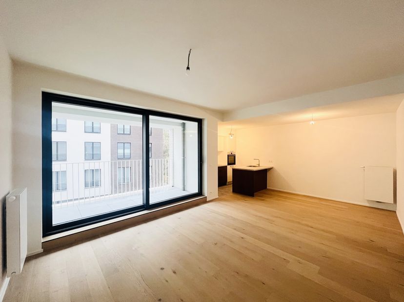 WOLUWE-SAINT-LAMBERT - Eerste bewoning - Dit lichte, gloednieuwe appartement (2 slaapkamers/2 badkamers) van 98 m² is ideaal gelegen op een steenworp