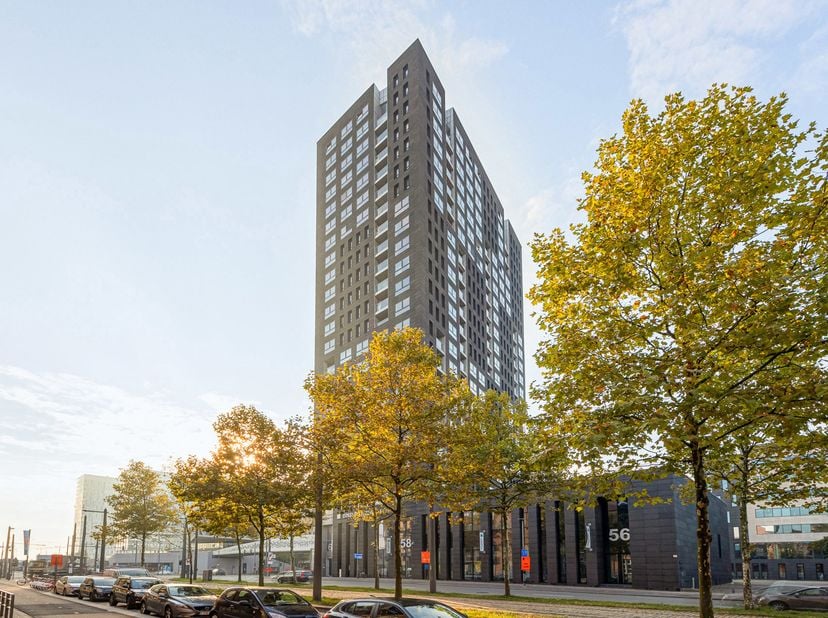 Modern appartement met 1 slaapkamer in 'London Tower' op het levendige Eilandje.<br />
Indeling: Inkomhal met vestiairekast en gastentoilet met handen