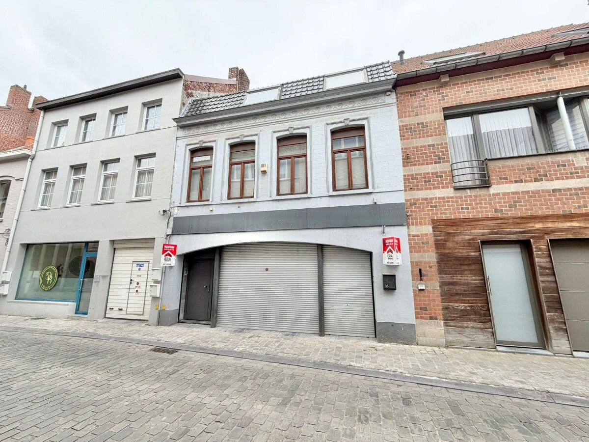 Handelspand met woonst te koop