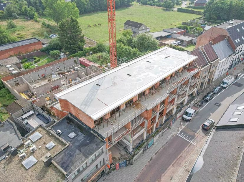 Dit nieuwbouwproject in het hart vanSint-Katelijne-Waver maakt professioneel ondernemen mogelijkop een centrale zichtlocatie. De site combineert resid