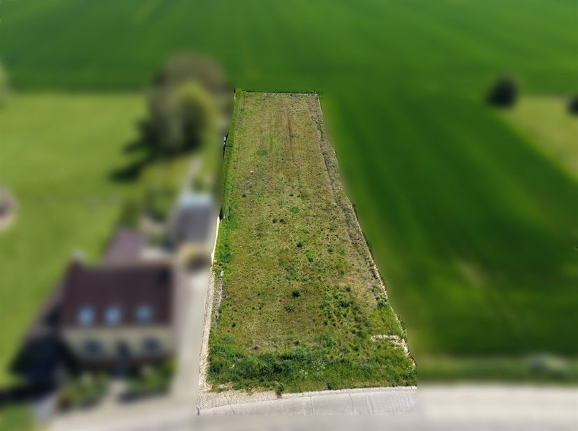 Prachtig perceel van 14 are 40 centiares gelegen in een landelijke woonwijk in het mooie dorpje Baugnies.<br />
<br />
Dit perceel is meer dan 19 me