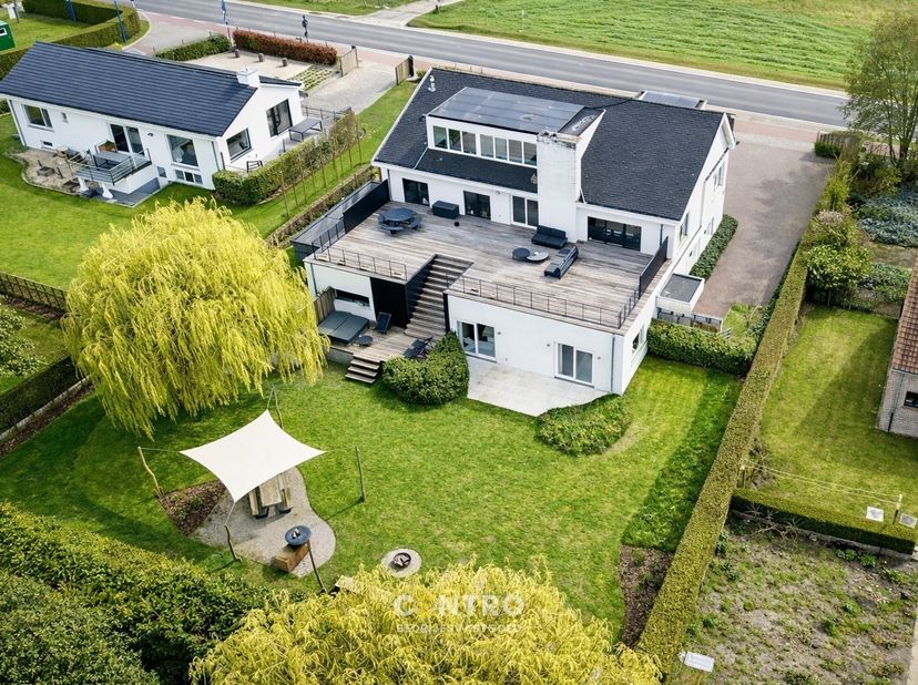 <br />
Dit veelzijdige PAND combineert wonen en werken op een uitzonderlijk comfortabele manier.<br />
Het beschikt over moderne kantoorruimten, een p