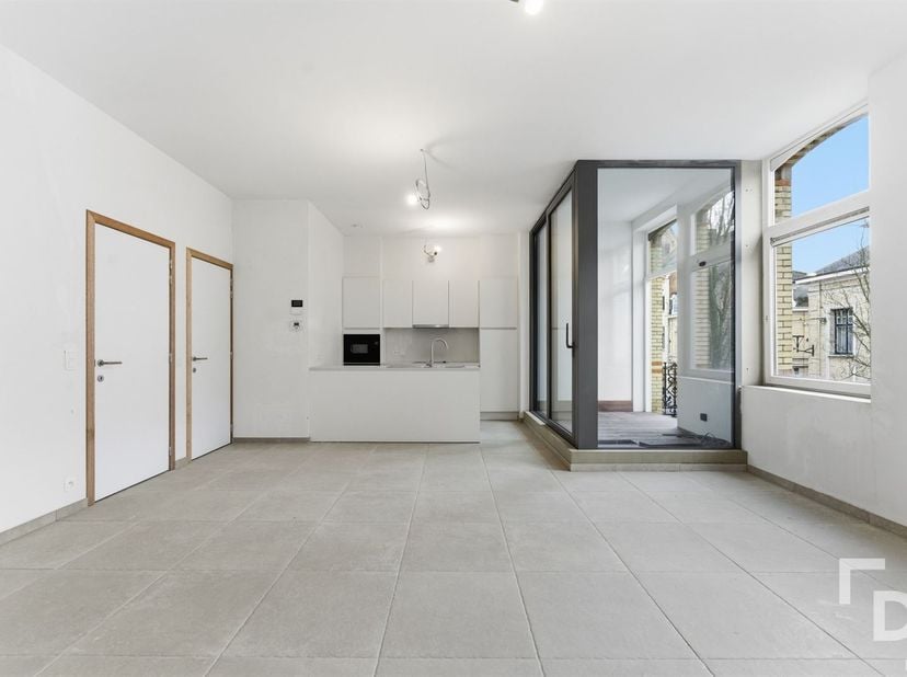 In de Rijselstraat te Ieper vinden we dit nieuwbouw appartement voorzien van 2 slaapkamers en 2 terrassen waarvan één inpandig.<br />
Het appartement