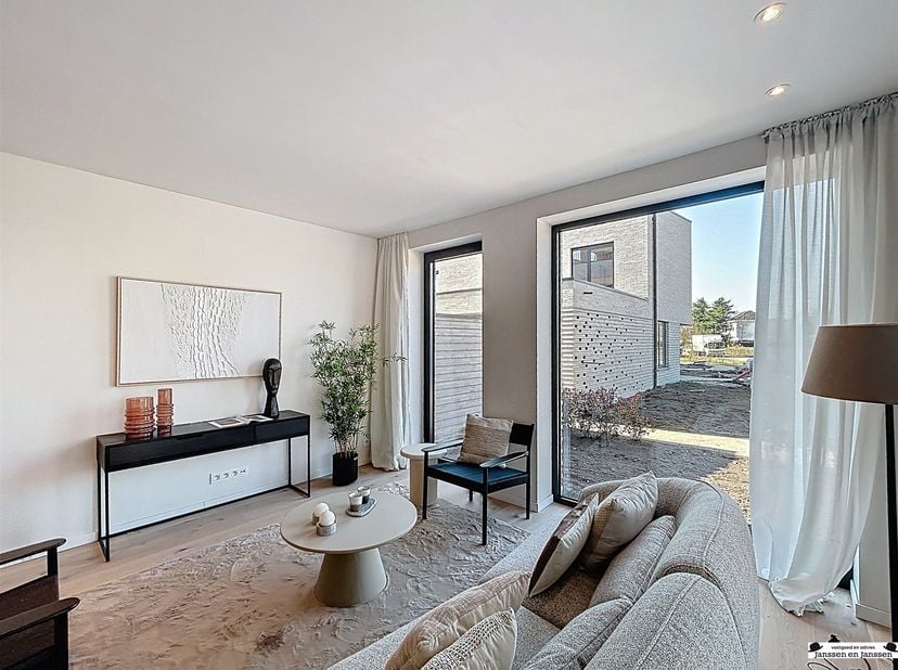 Luxueus energiezuinig nieuwbouw appartement 0.4 gelegen in blok B<br />
<br />
Het gelijkvloers appartement heeft een oppervlakte van 94,4 m2, 2 sla