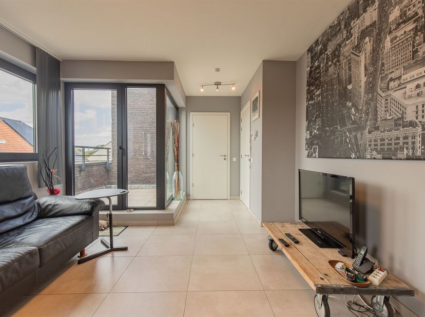 Prachtig en energiezuinig dakappartement in residentie Albertina te Baasrode<br />
Op zoek naar een instapklaar en energiezuinig appartement met een