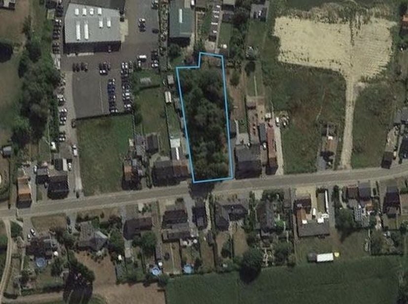 BOUWEN OP EEN TOPLOCATIE IN HASSELT: RUIMTE, RUST EN POTENTIEEL.Aan de Oude Truierbaan in Hasselt bevindt zich dit uitzonderlijke perceel bouwgrond va
