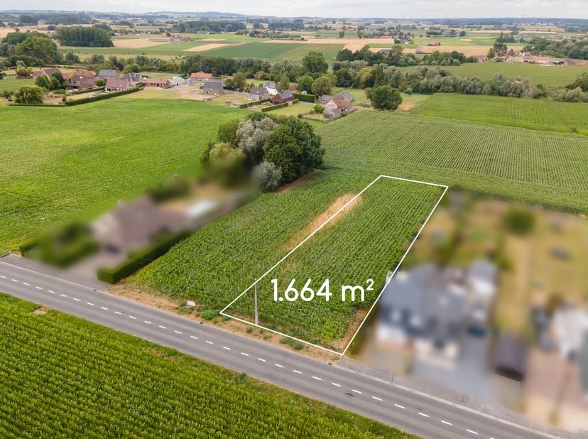 Belle parcelle de terrain constructible d’une superficie d’environ 1 664 m², offrant de nombreuses possibilités pour la réalisation de votre futur pro