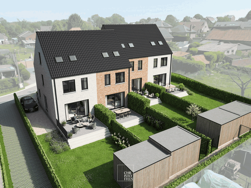 INDELING &amp;amp; AFWERKING<br />
De woning verwelkomt u via een inkomhal met apart gastentoilet. Van hieruit bereikt u de aangename leefruimte, waar gro