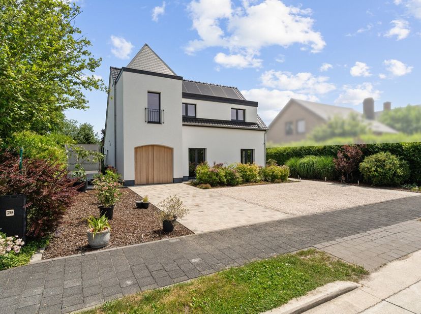 Stijlvolle, instapklare open bebouwing in een residentiële en kindvriendelijke wijk te Lovendegem Ontdek deze prachtige, statige energiezuinige open b