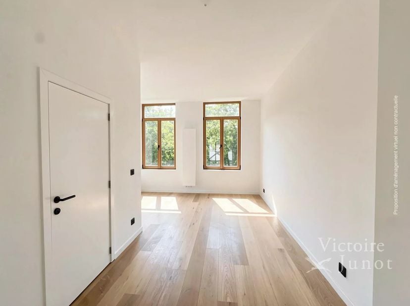 Victoire-Junot stelt u met plezier deze prachtige nieuwe duplex met twee slaapkamers voor, gelegen in een kleinschalig, volledig gerenoveerd gebouw, i