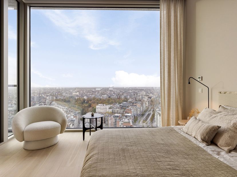 Eén van de iconische gebouwen die de skyline van Antwerpen vormen. <br />
Wonen in het centrum van de Stad, aan het vernieuwde operaplein, op de kroon