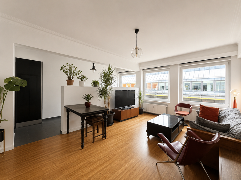 Ideaal gelegen in het hart van de Europese Wijk, bieden wij u dit lichtrijke appartement met 1 slaapkamer van ±65 m² aan, gelegen op de 6e verdieping