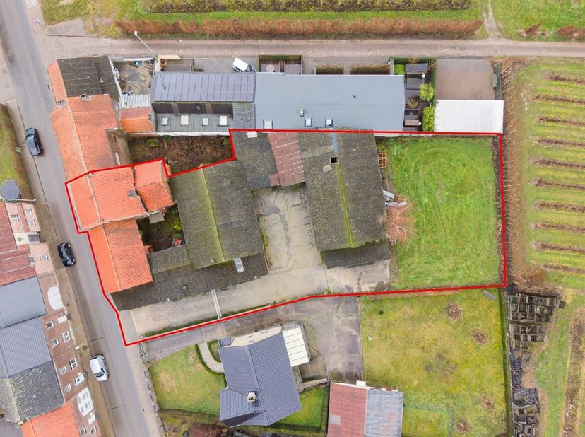 Projectgrond van 17are39ca met te slopen woning (bouwjaar 1947) gelegen aan de Groot-Gelmenlaan in Sint-Truiden. Dit perceel biedt een interessante op
