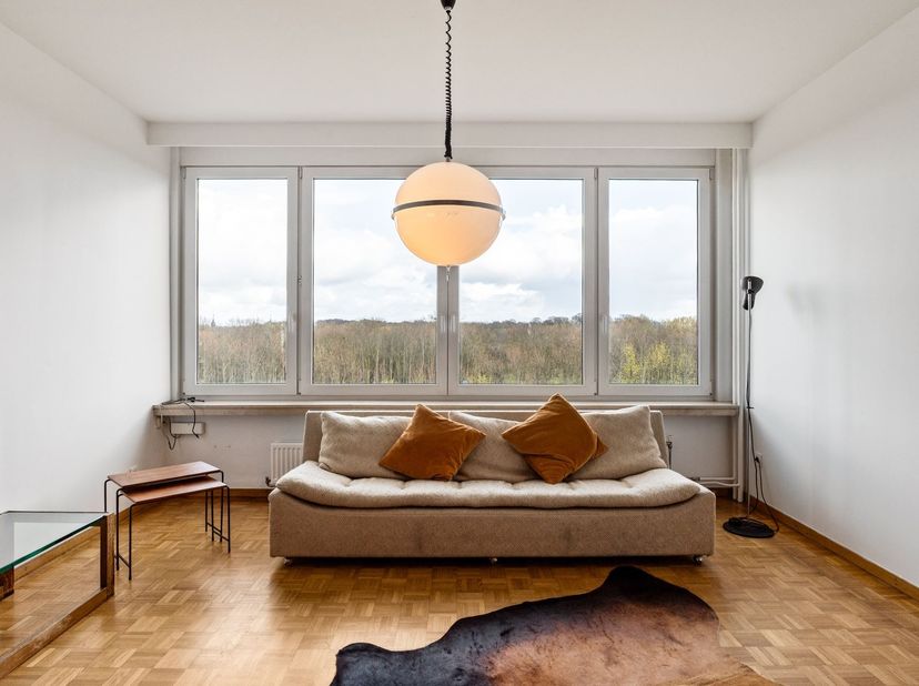 Dit appartement bevindt zich op de 6de verdieping van een verzorgd gebouw op de Wouter Haecklaan, pal naast het Park Rivierenhof in Deurne-Zuid. Met g