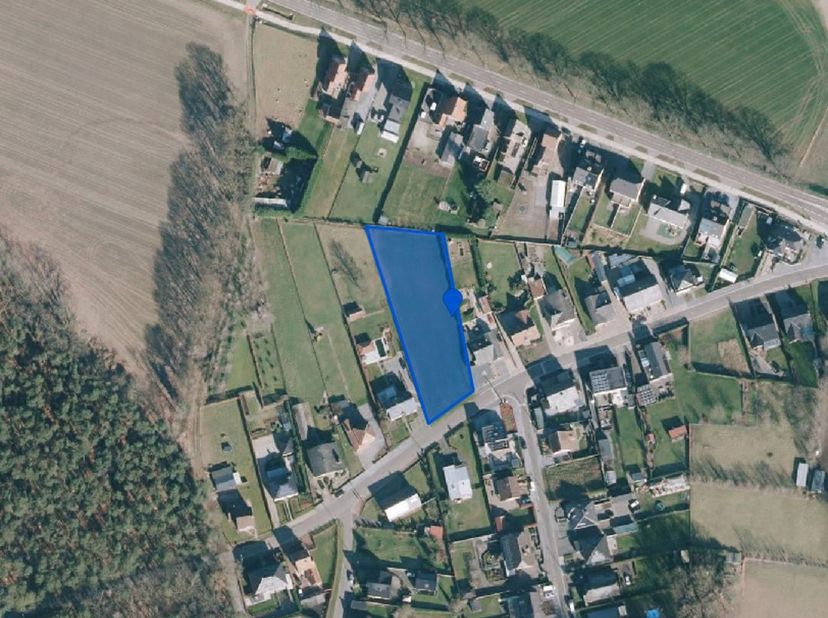 Royale bouwgrond op een perceel van 29a 20ca in de dorpskern van Neerglabbeek met eventueel mogelijkheid - onder voorbehoud van vergunning - tot verka