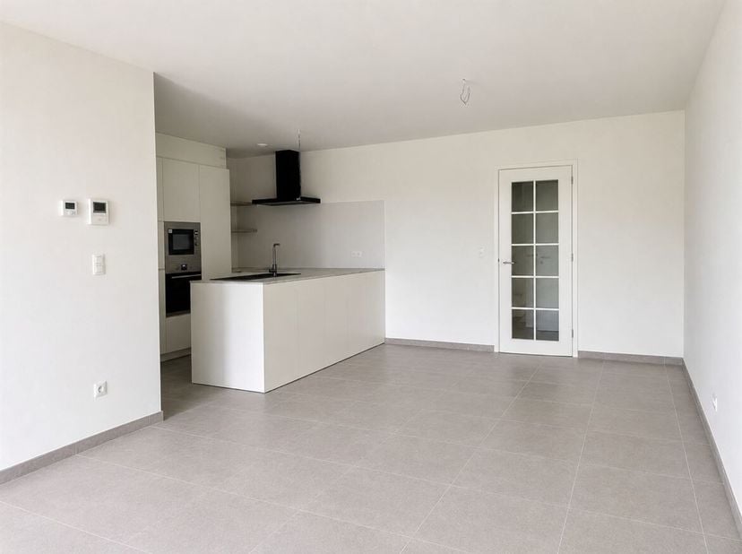 Prachtig gelijkvloers appartement met 2 slaapkamers, autostaanplaats en ruime tuin op toplocatie!<br />
Ligging<br />
Dit energiezuinige BEN-apparteme