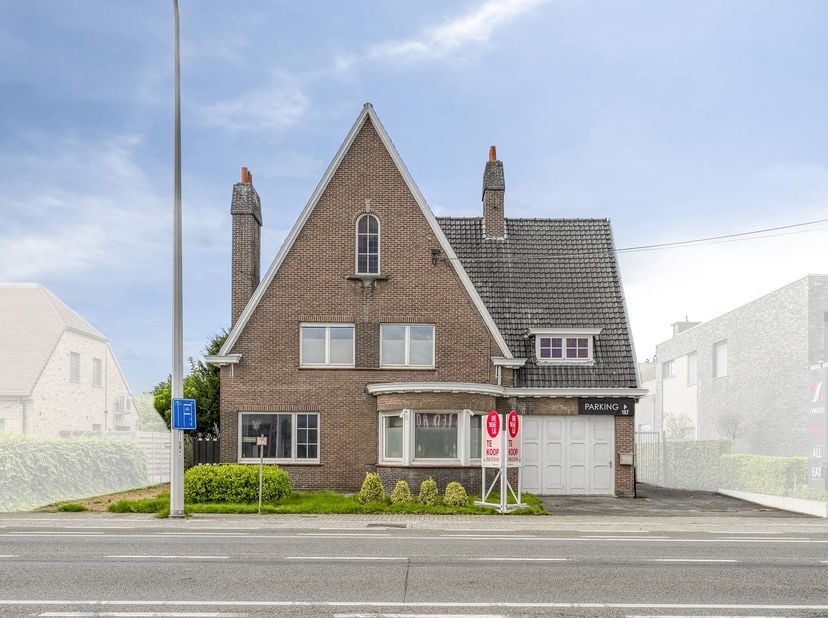 Indeling van de woning<br />
Gelijkvloers:<br />
- Ruime inkomhal met een gastentoilet.<br />
- Lichtrijke woonkamer, sfeervol opgedeeld in een gezell