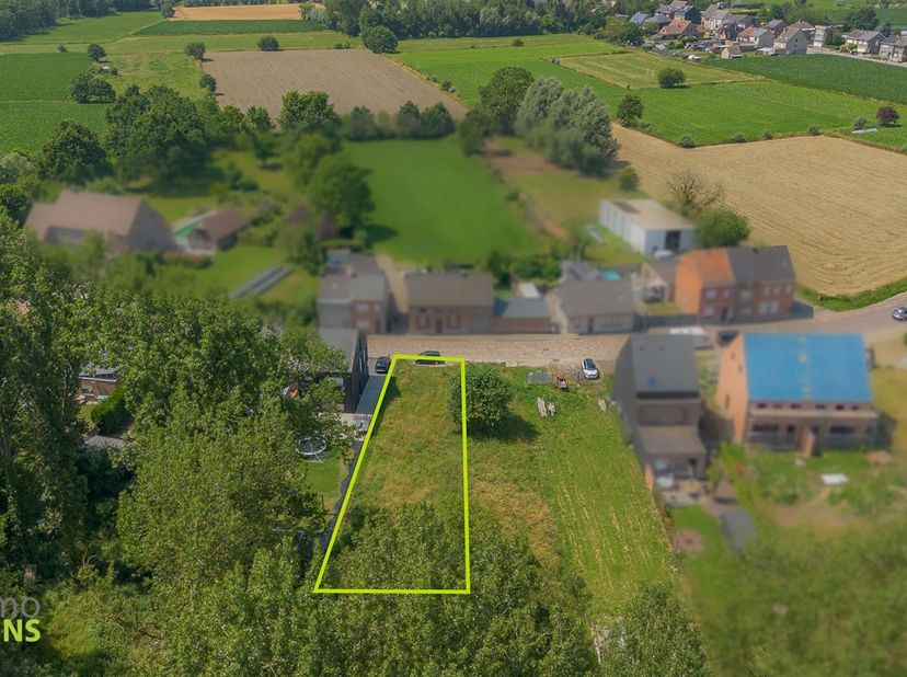 Bouwgrond voor halfopen bebouwing te Lebbeke<br />
Ontdek deze prachtige bouwgrond voor een halfopen bebouwing op een gunstige ligging nabij het poel