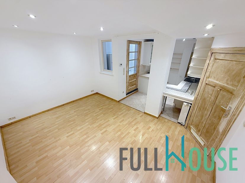 Ukkel, Prachtige begane grond met een oppervlakte van +-60 m2 woonoppervlak met terras op het zuiden, Woonkamer van +- 25m2 met super ingerichte open