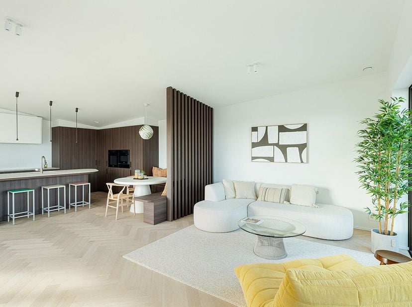 Dit uitzonderlijk verblijf maakt deel uit van het prestigieuze project Kalvekeet, een autovrij en groen woonerf aan de rand van Knokke. Hier woont U i