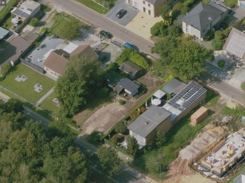 Bouwgrond voor Open bebouwing van 8a80ca te Genk.<br />
Omgeving: Deze bouwgrond is gelegen aan de Maaseikerbaan, net buiten het centrum van Genk. <br