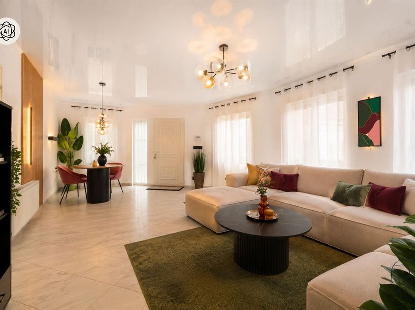 Verrassend ruime woning met 5 slaapkamers, zeer grote garage en stadstuin, goed gelegen langs een invalsweg! <br />
Ideaal voor grote gezinnen of wie
