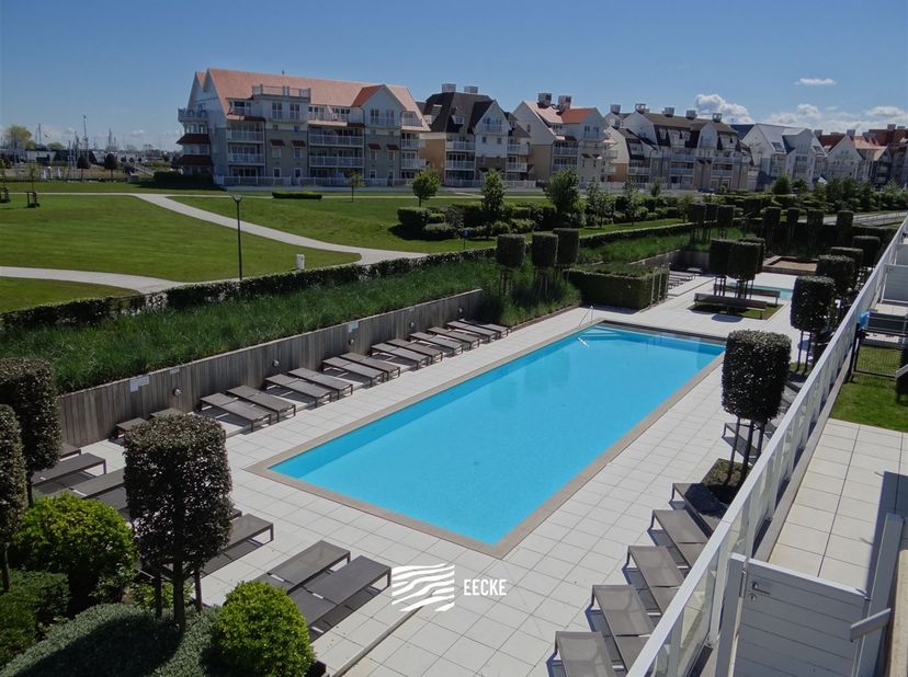 Villa Capricia 0103 - Appartement ensoleillé prêt à l'emploi avec deux chambres à coucher - Résidence de classe avec jardin commun équipé d'une piscin