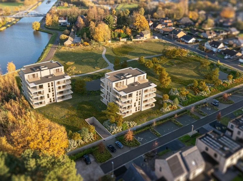Residentie Blue Barrier: Heerlijk genieten met zicht op natuur en water in Lommel:Prachtig nieuwbouwappartement met één slaapkamer en terras, aan het