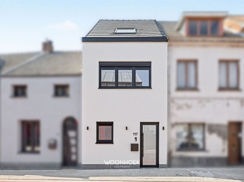 MAISON CONVIVIALE ET MODERNE À WAASMUNSTER<br />
<br />
Cette maison élégamment rénovée à Waasmunster offre un mélange parfait entre confort contemp