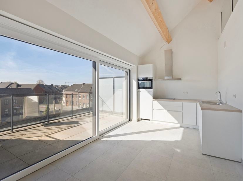 UNIEK PENTHOUSE (DUPLEX) VAN 192 M² MET 3 SLPK'S MET PRACHTIG ZICHT IN BORGLOON<br />
Aan het Stroopplein vindt u dit unieke duplex-appartement terug