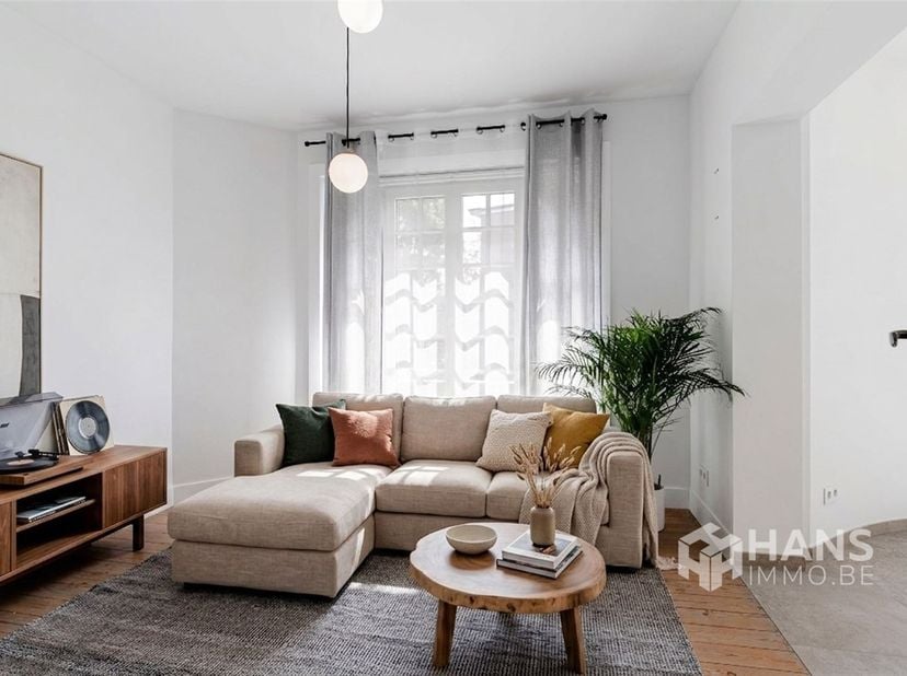 Instapklaar appartement (73 m²) met 1 slaapkamer en tuin (17 m²) in Mortsel.<br />
In een rustige eenrichtingsstraat in het centrum van Mortsel bevin