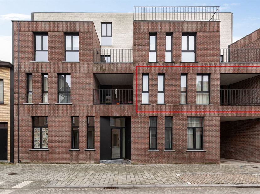 Nieuwbouwappartement met 3 slaapkamers en twee overdekte terrassen<br />
Omschrijving<br />
Eerste verdieping<br />
Via de inkomhal betreedt u het app