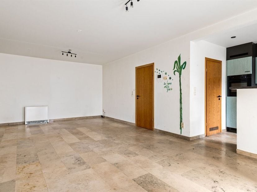 Appartement clé en main au rez-de-chaussée avec jardin<br />
Situation<br />
Cet appartement de plain-pied bénéficie d'une situation privilégiée à pro