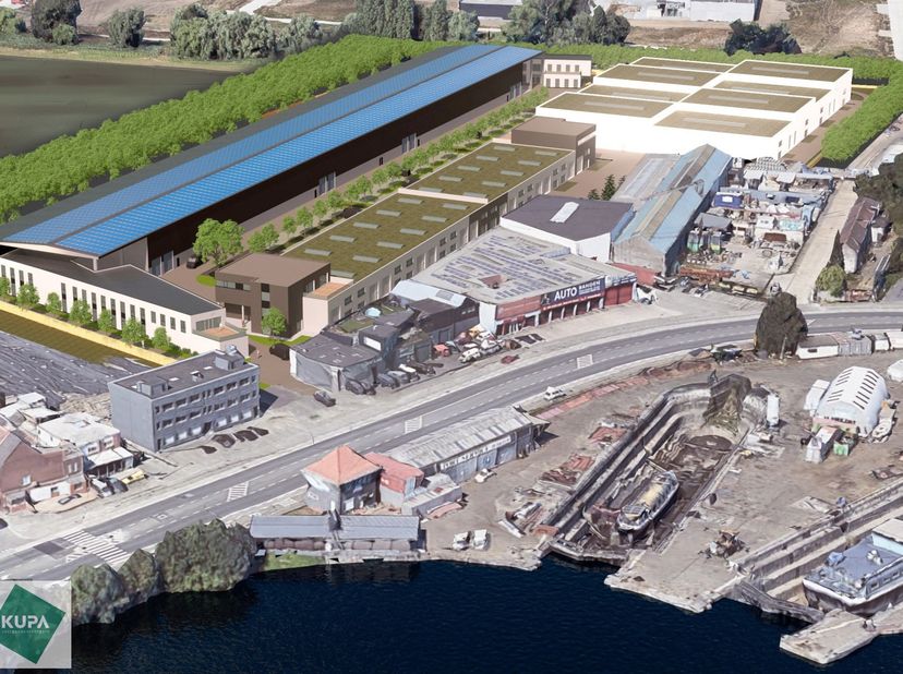 Deze modern en strategisch gelegen KMO-unit bevindt zich aan de Wiedauwkaai in de voorhaven van Gent, met vlotte bereikbaarheid via de R40 en een bush