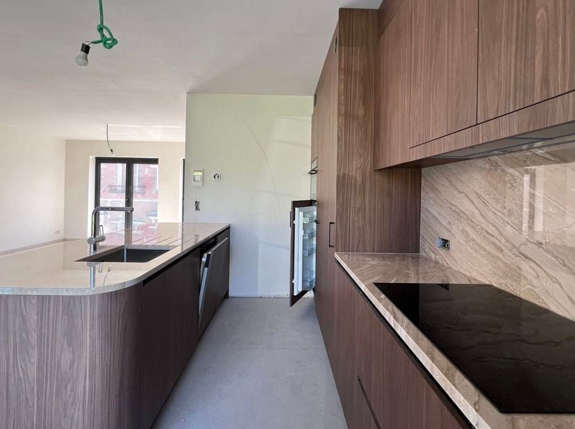 Deze aangename, luxueus afgewerkte nieuwe BEN-woning is gelegen in het zo rustige en landelijke Aaigem, in het centrum van het beschermd dorpszicht, o