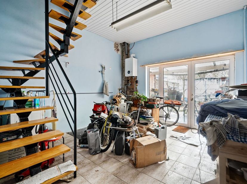 Authentieke stadswoning met 3 slaapkamers en zuidwest-gerichte tuin in het centrum van Mechelen. <br />
Deze charmante rijwoning in de Plankstraat bie