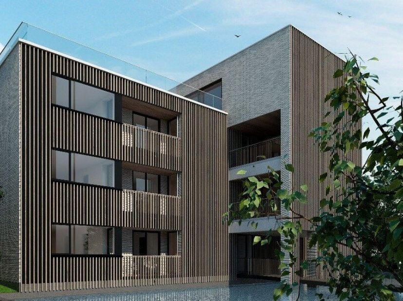 Appartement met 2 slaapkamers met zeer ruim terras (98 m²) gelegen op de derde verdieping: Inkom met gastentoilet en ruimte voor vestiaire geven toega