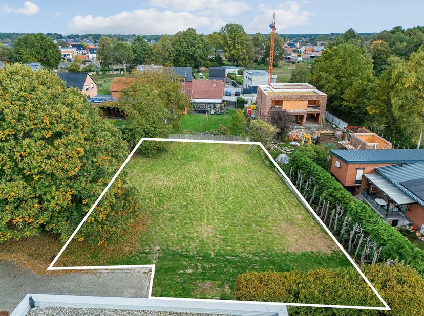 Beau terrain à bâtir dans une impasse d'une superficie de 852 m² à proximité du centre de Mol (Ginderbuiten). Convient pour la construction d'une mais