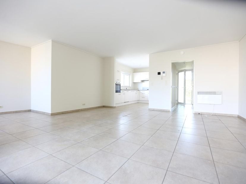 Magnifique appartement neuf &amp;laquo; passif &amp;raquo; (1er &amp;eacute;tage) avec terrasse, cave et parking et jardin commun. Superficie hab. 101 m&amp;sup2;. Si