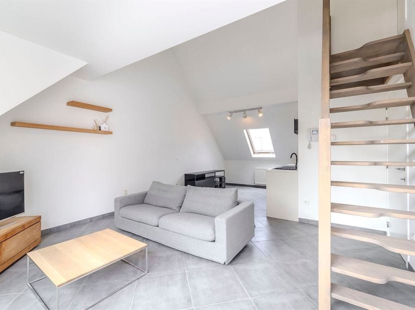 Designappartement met uitzonderlijk Zonneterras van 30m²  en Garage in Centrum Geel<br />
In het centrum van Geel bevindt zich dit lichtrijke, archite