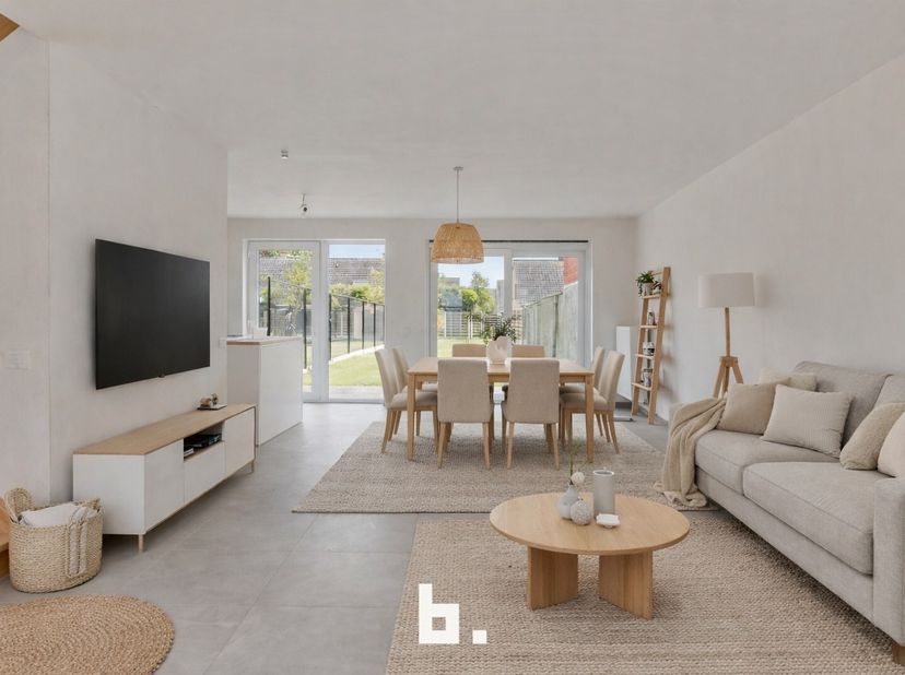 Ontdek deze leuke, ruime en energiezuinige moderne nieuwbouwwoning op een zuidgericht perceel vlakbij het centrum van Kortrijk, doch op een uitstekend