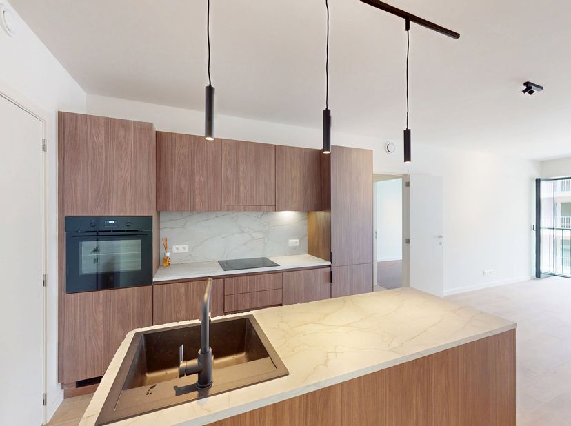 Lichtrijk nieuwbouwappartement met 2 slaapkamers<br />
Dit nieuwbouwappartement van het project De Groene Poort is gelegen aan de Eugène de Plynstraat