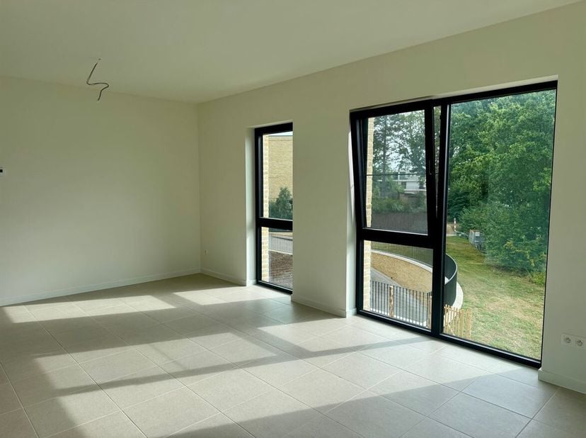 Magnifique appartement neuf de 2 chambres, avec place de parking et terrasse exposée sud à Lier !<br />
Situation<br />
Cet appartement BEN à faible c