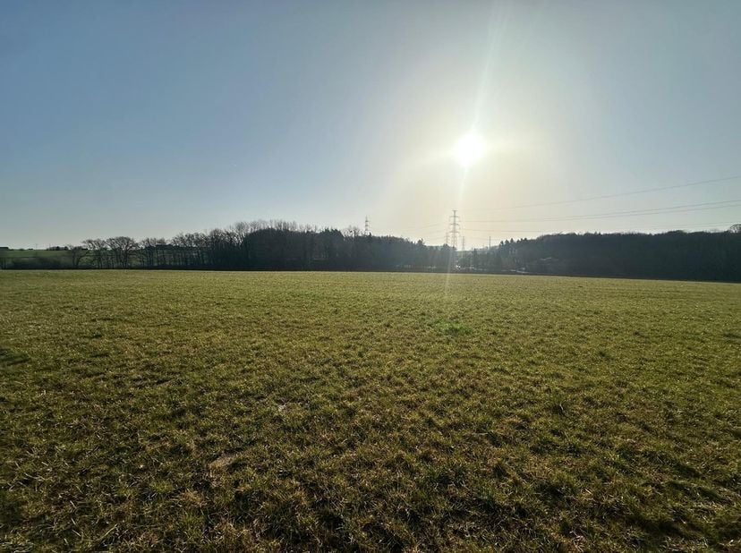 COGNELEE, idéalement situé dans un environnement rural et campagnard.<br />
Terrain de 1085 m² (lot 06)<br />
<br />
Permis d’urbanisme obtenu pour un