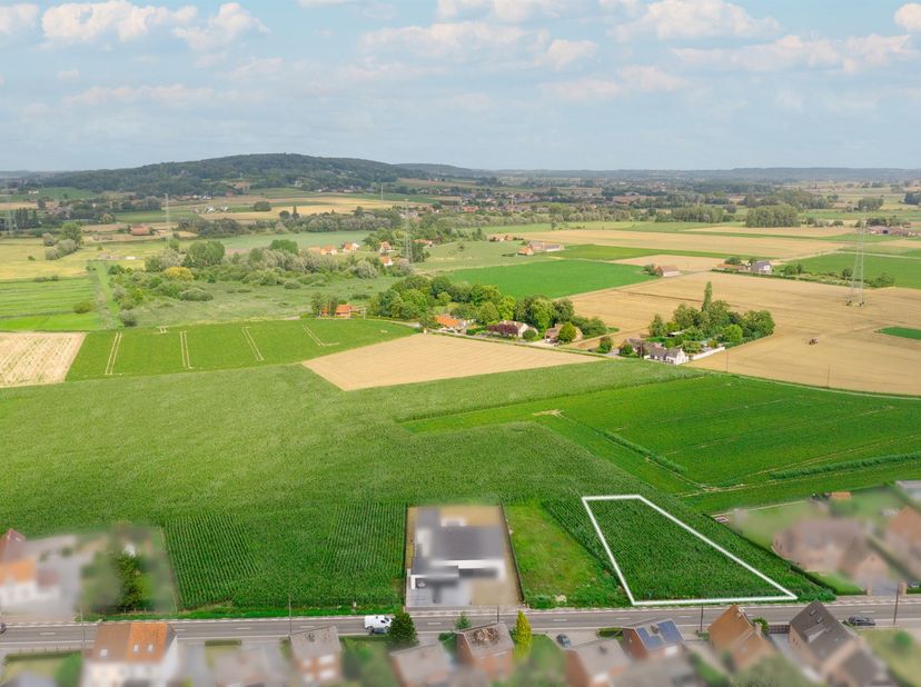 Op zoek naar de perfecte locatie om uw droomwoning te realiseren? Dit ruim perceel van 1.193 m², bestemd voor open bebouwing, biedt u alle vrijheid en