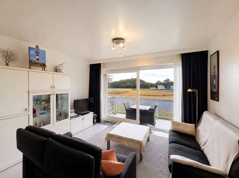 Schitterend appartement met verzicht (type doorloper) op het gelijkvloers van een goed onderhouden residentie, ideaal gelegen op een toplocatie in Nie
