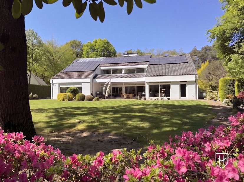 Une vie exclusive dans un endroit exceptionnel, juste en face du magnifique parc national de la Haute Campine.<br />
Cette élégante villa avec piscin